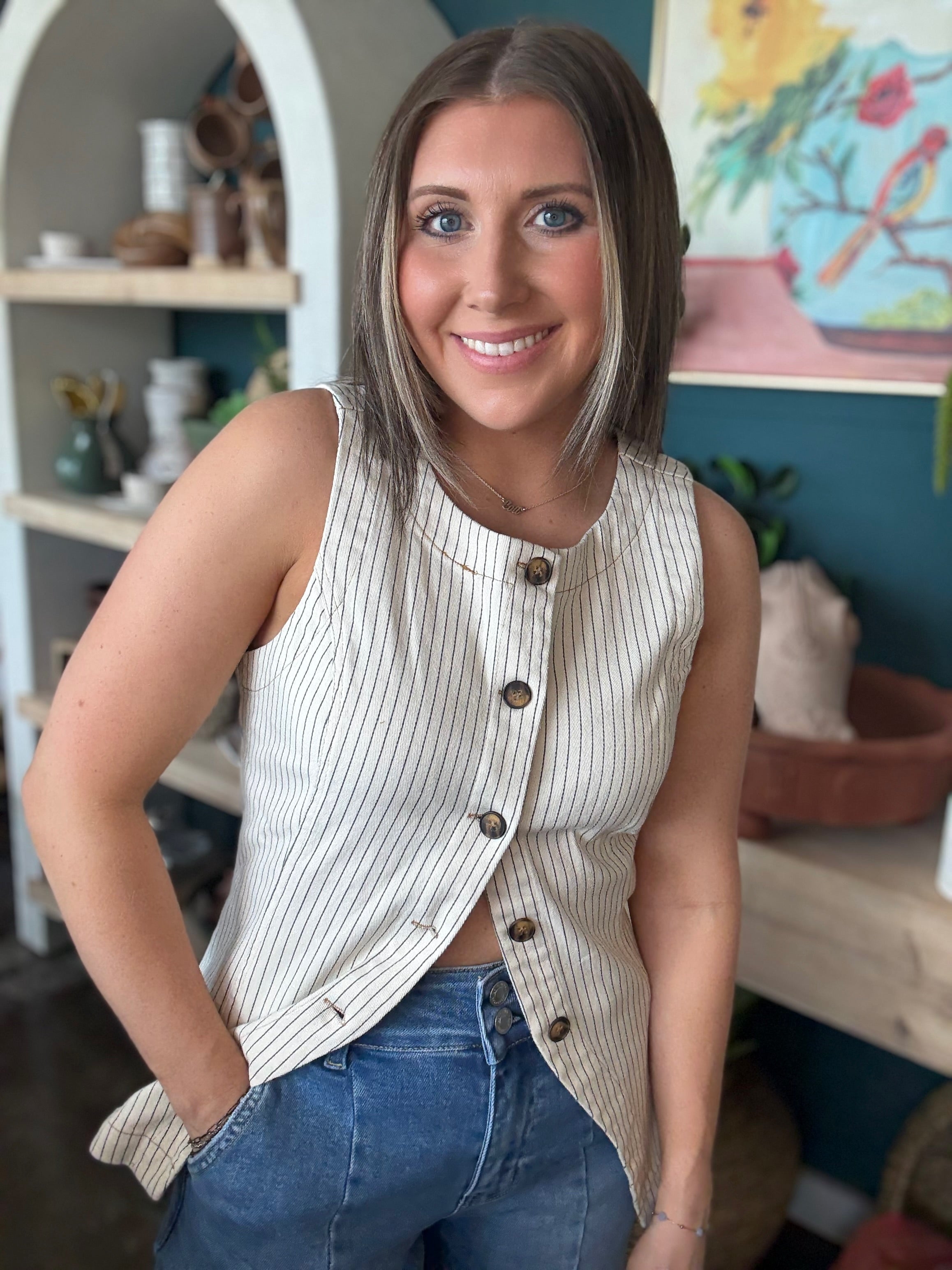 woman wearing natural striped sleeveless boutique button front tank top
