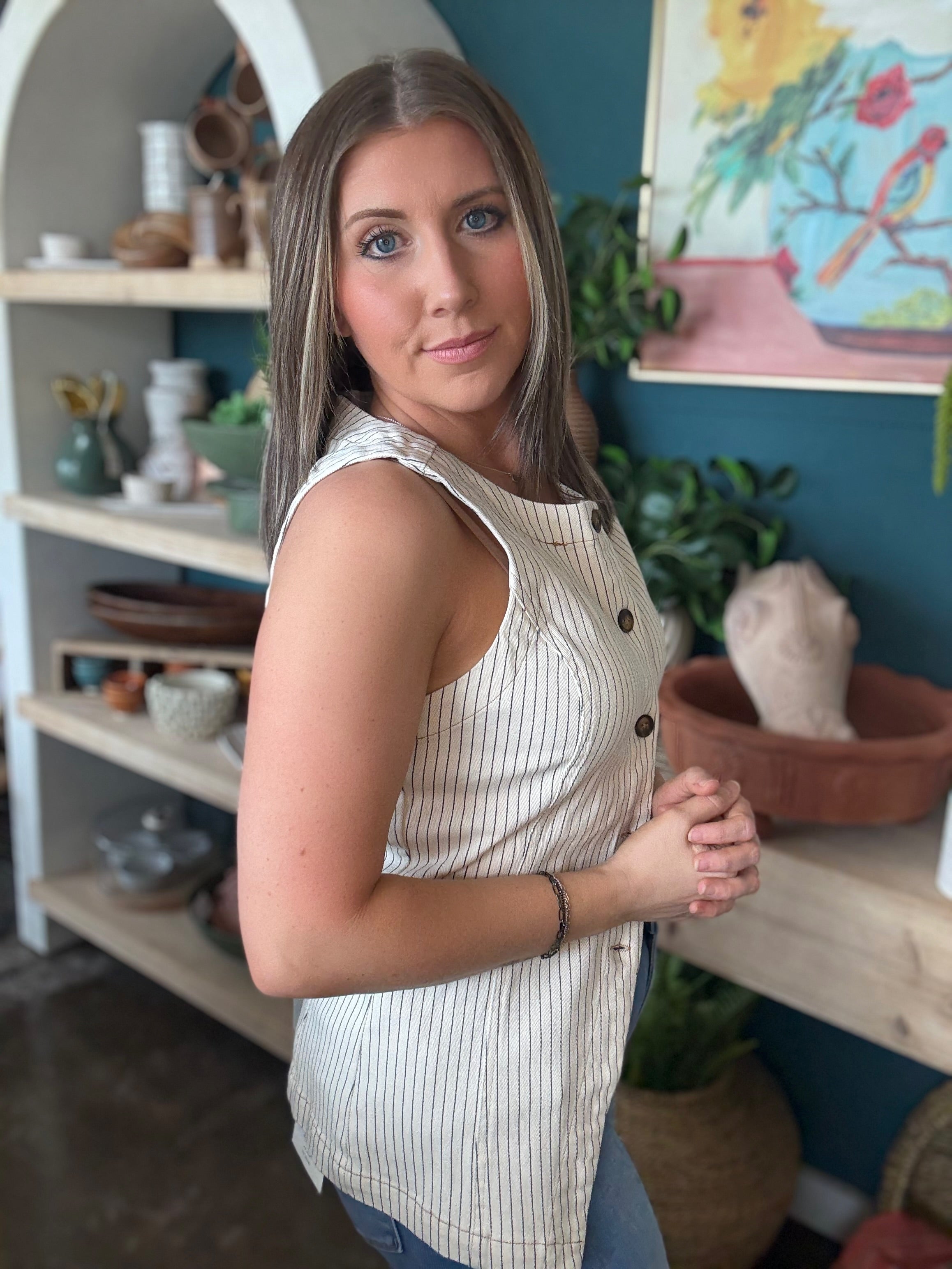woman wearing natural striped sleeveless boutique button front tank top