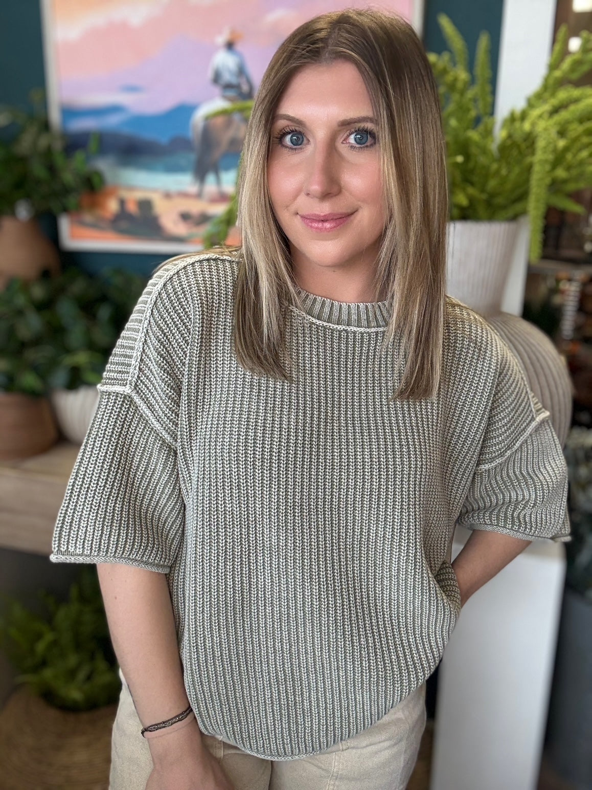 Sage ribbed knit short sleeve boutique top styled with neutral pants at Pill Box Boutique