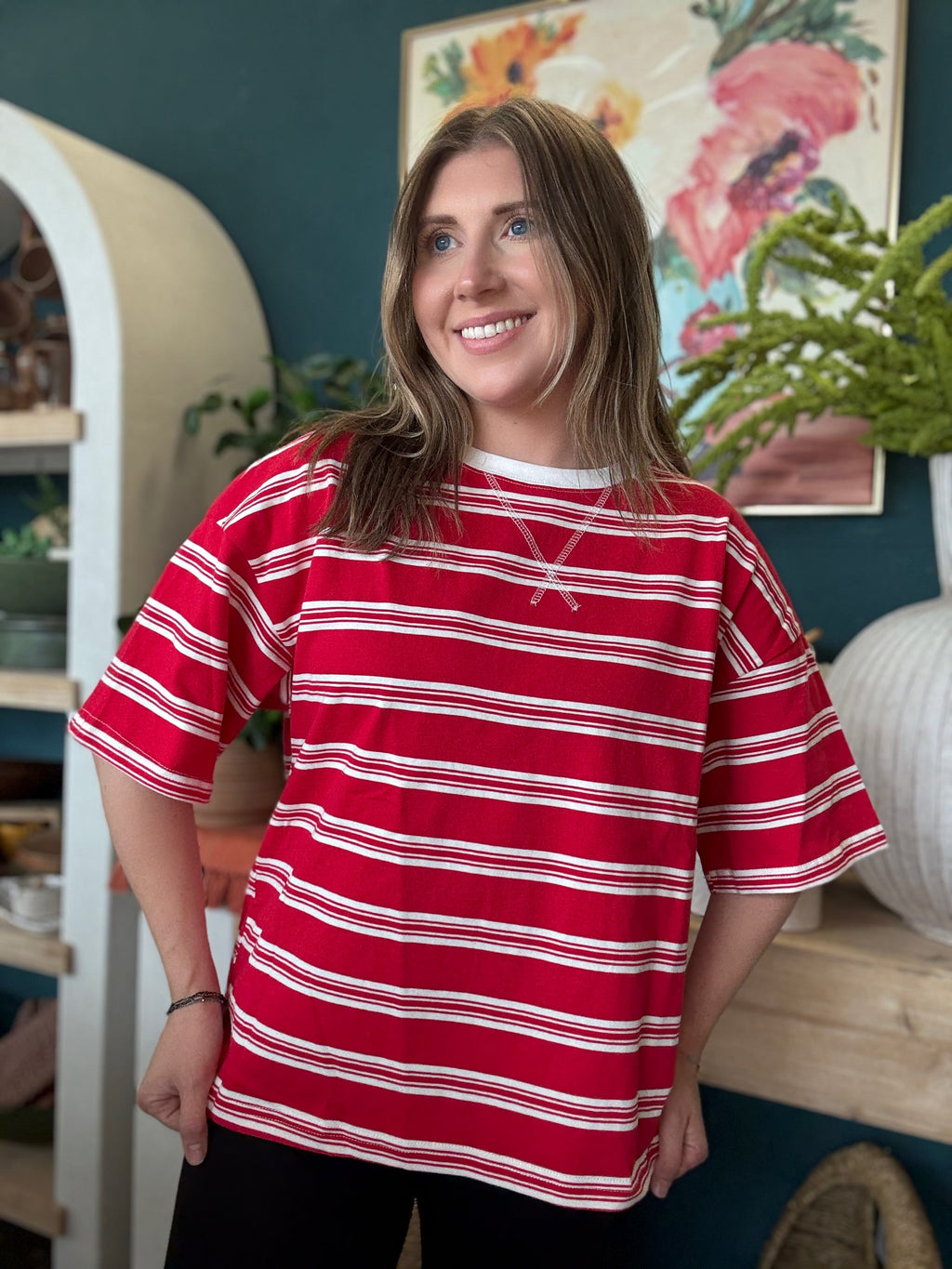 woman wearing red and white striped oversized patriotic boutique tee