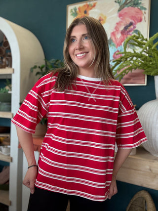 woman wearing red and white striped oversized patriotic boutique tee