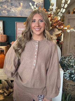 Taupe henley sweater top with button neckline and balloon sleeves