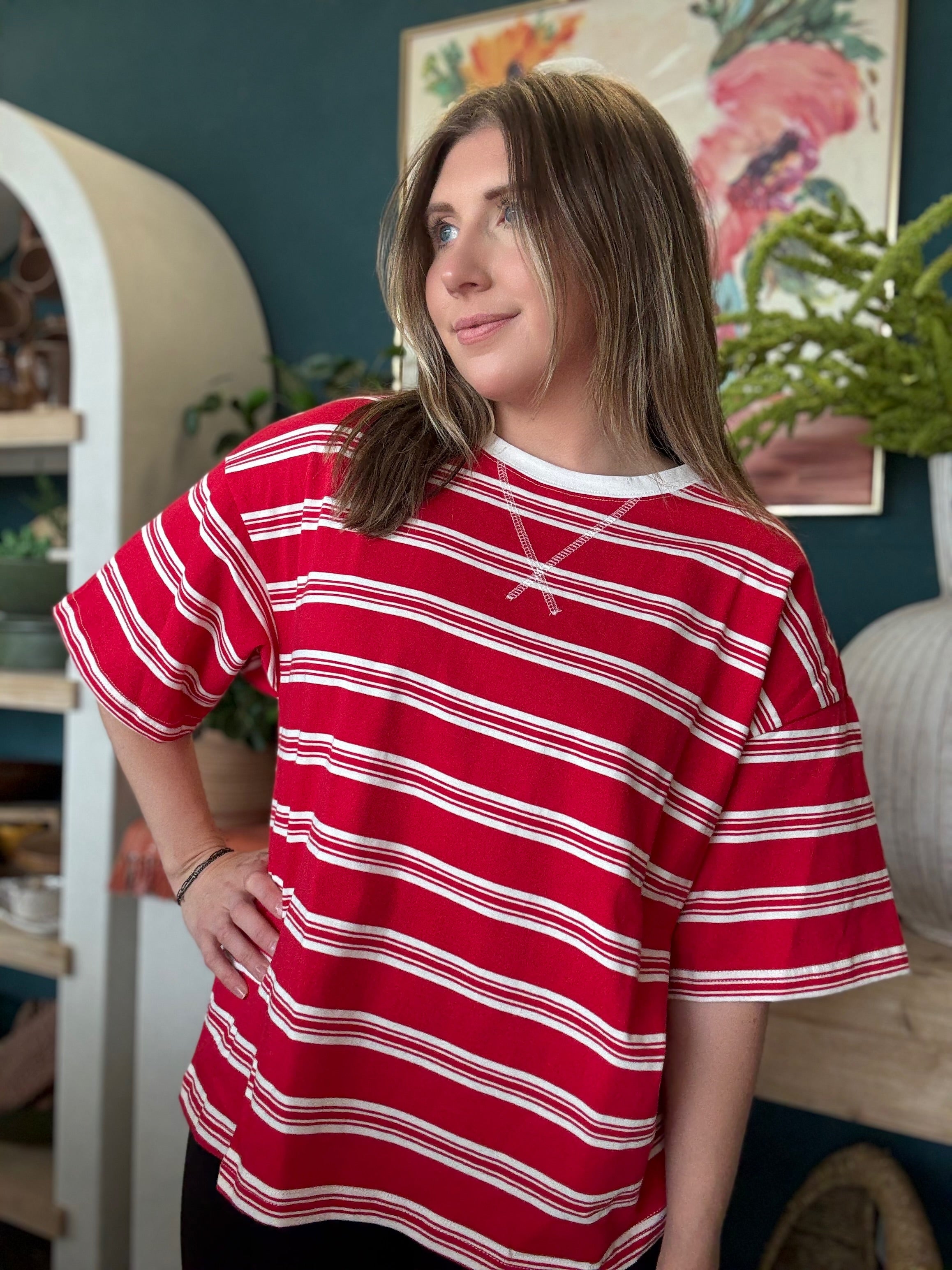 woman wearing red and white striped oversized patriotic boutique tee