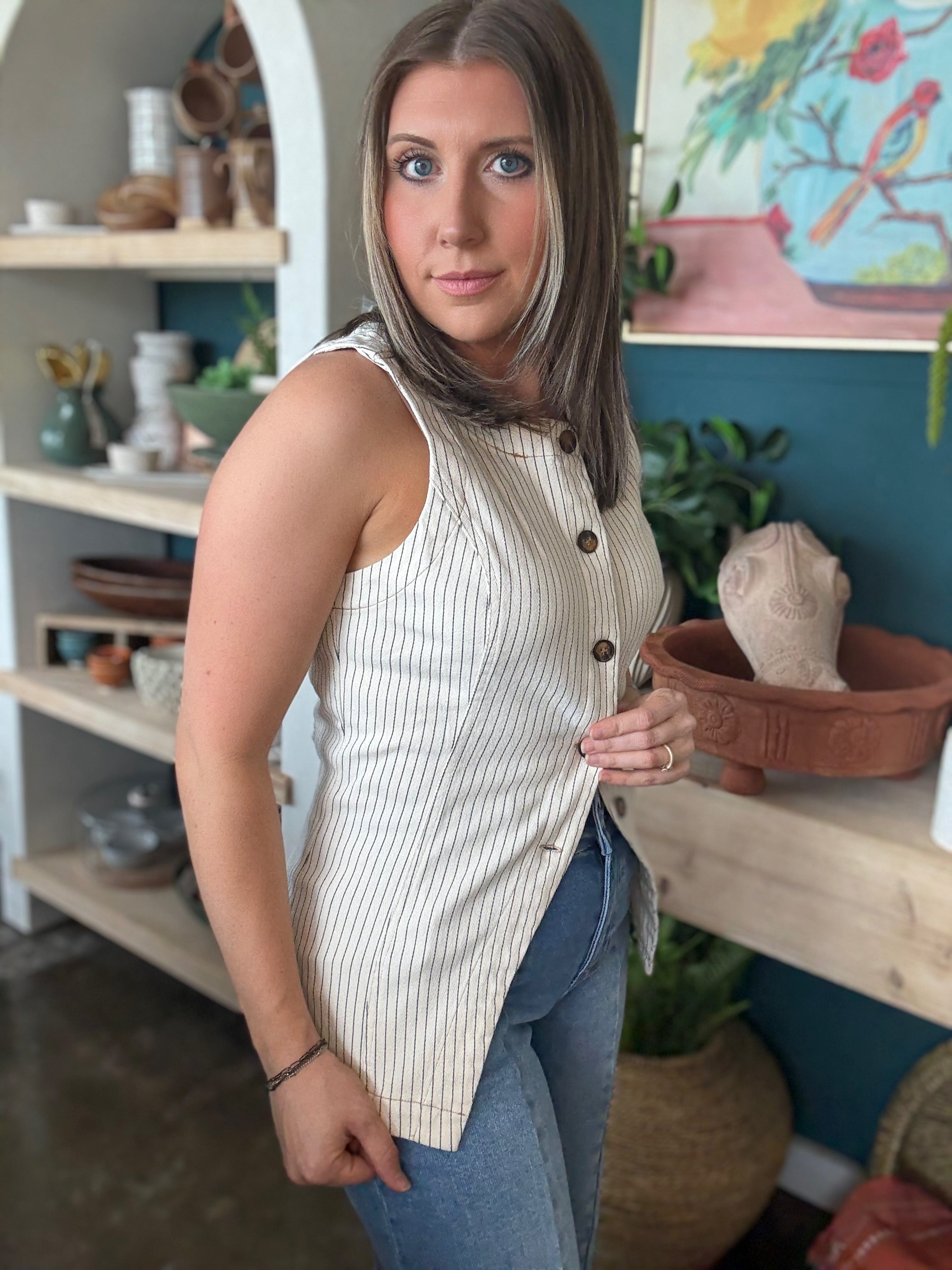 woman wearing natural striped sleeveless boutique button front tank top