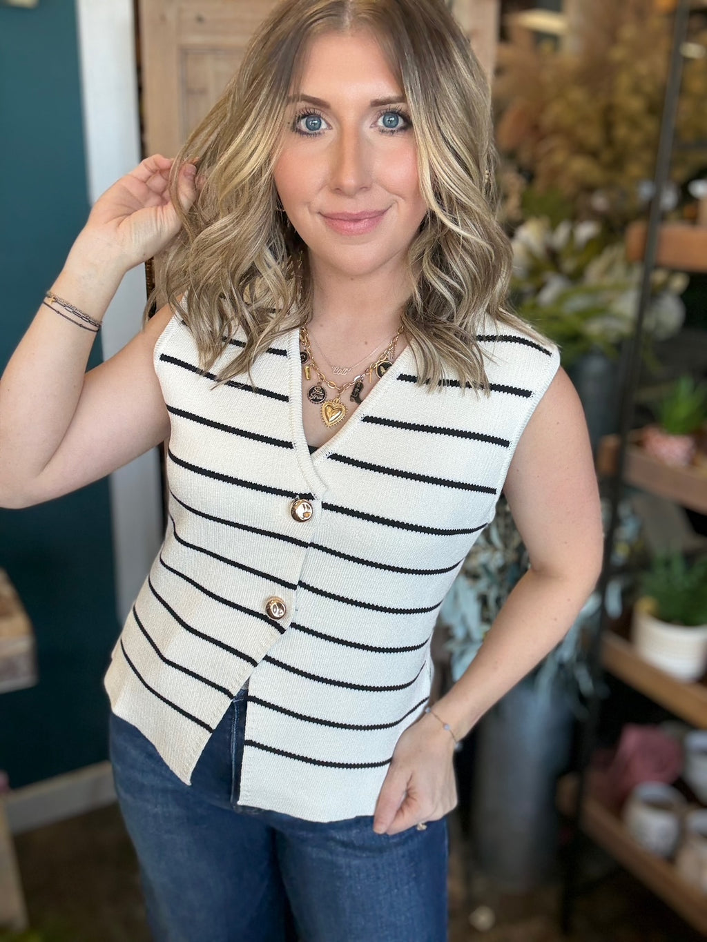 Cream and black striped button front sweater vest boutique top for women