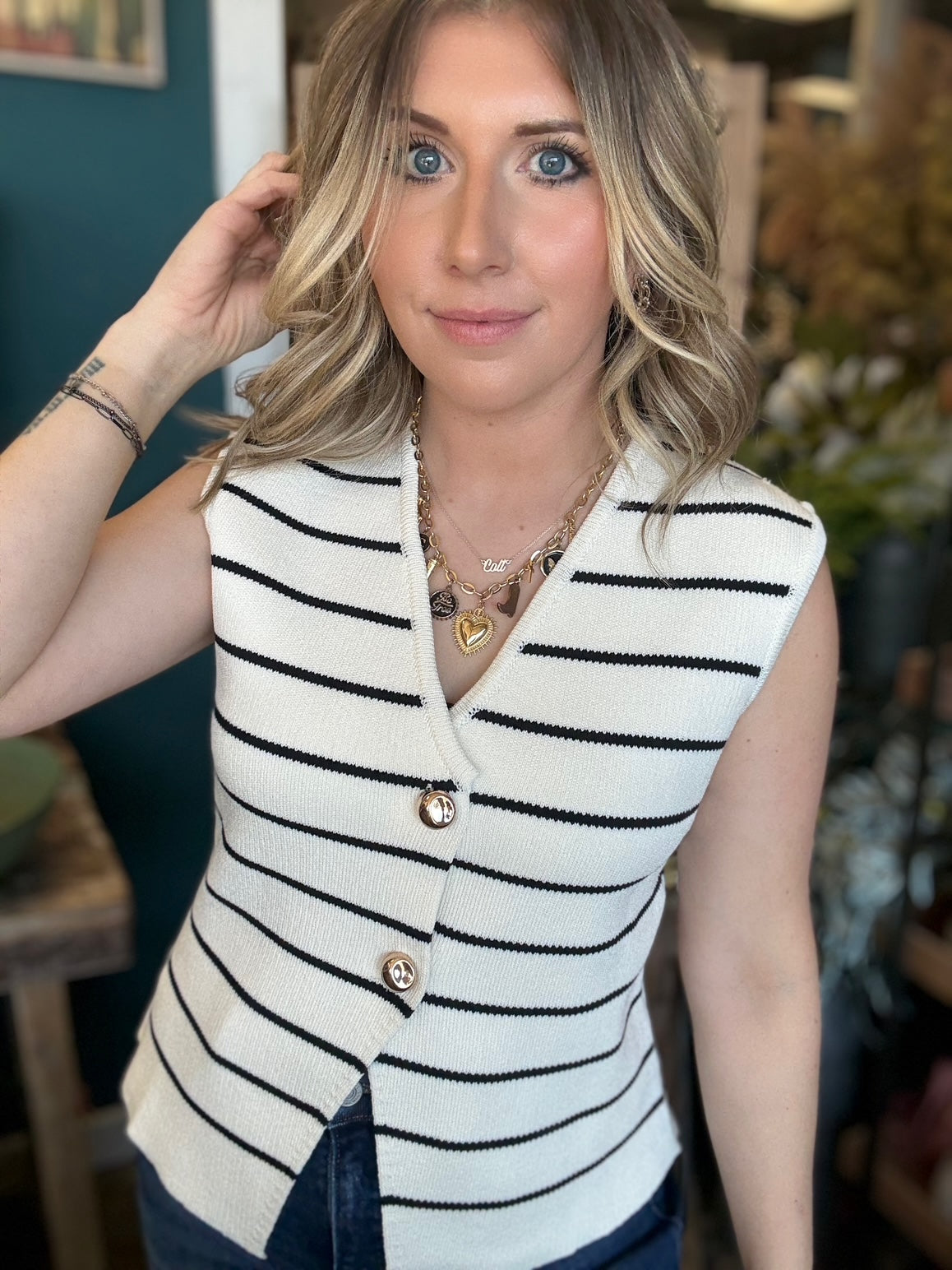 Cream and black striped button front sweater vest boutique top for women