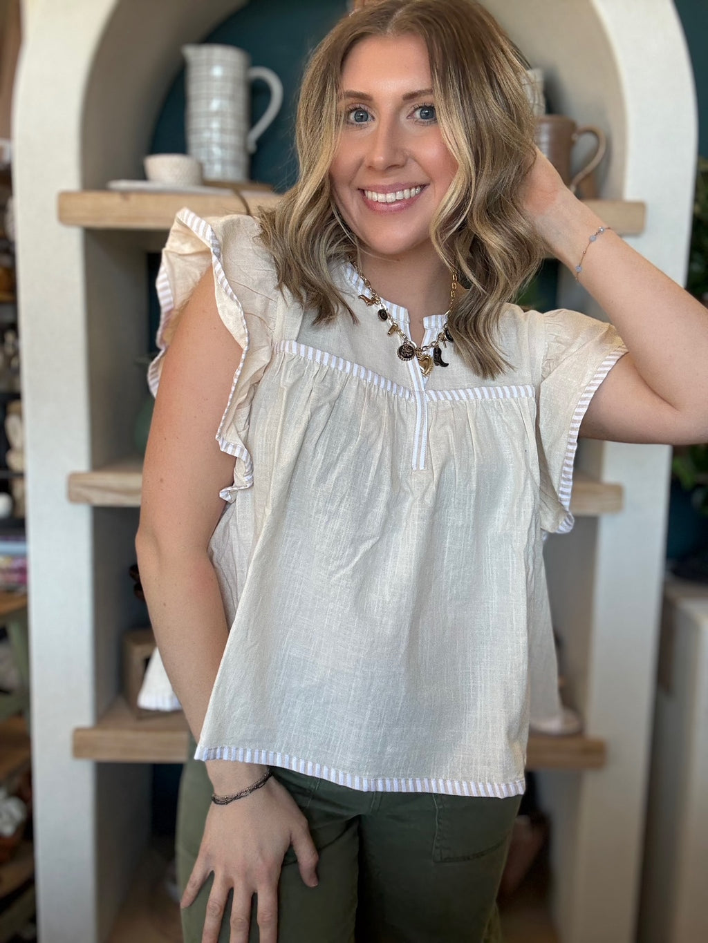 Ivory flutter sleeve boutique blouse for women