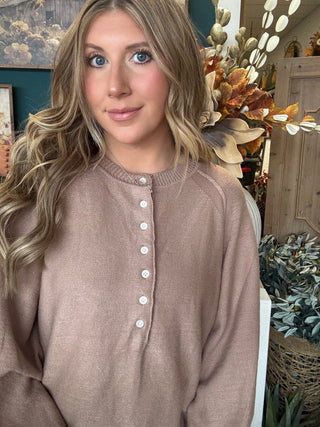 Taupe henley sweater top with button neckline and balloon sleeves