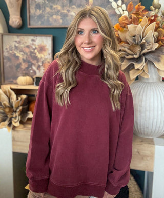 Burgundy mock neck sweatshirt with relaxed oversized fit