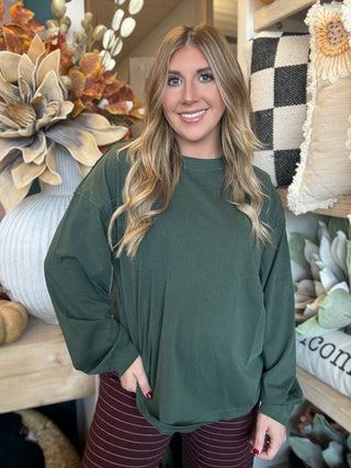 Woman wearing a regency-green washed long-sleeve tee with dropped shoulders and balloon sleeves