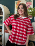 woman wearing red and white striped oversized patriotic boutique tee