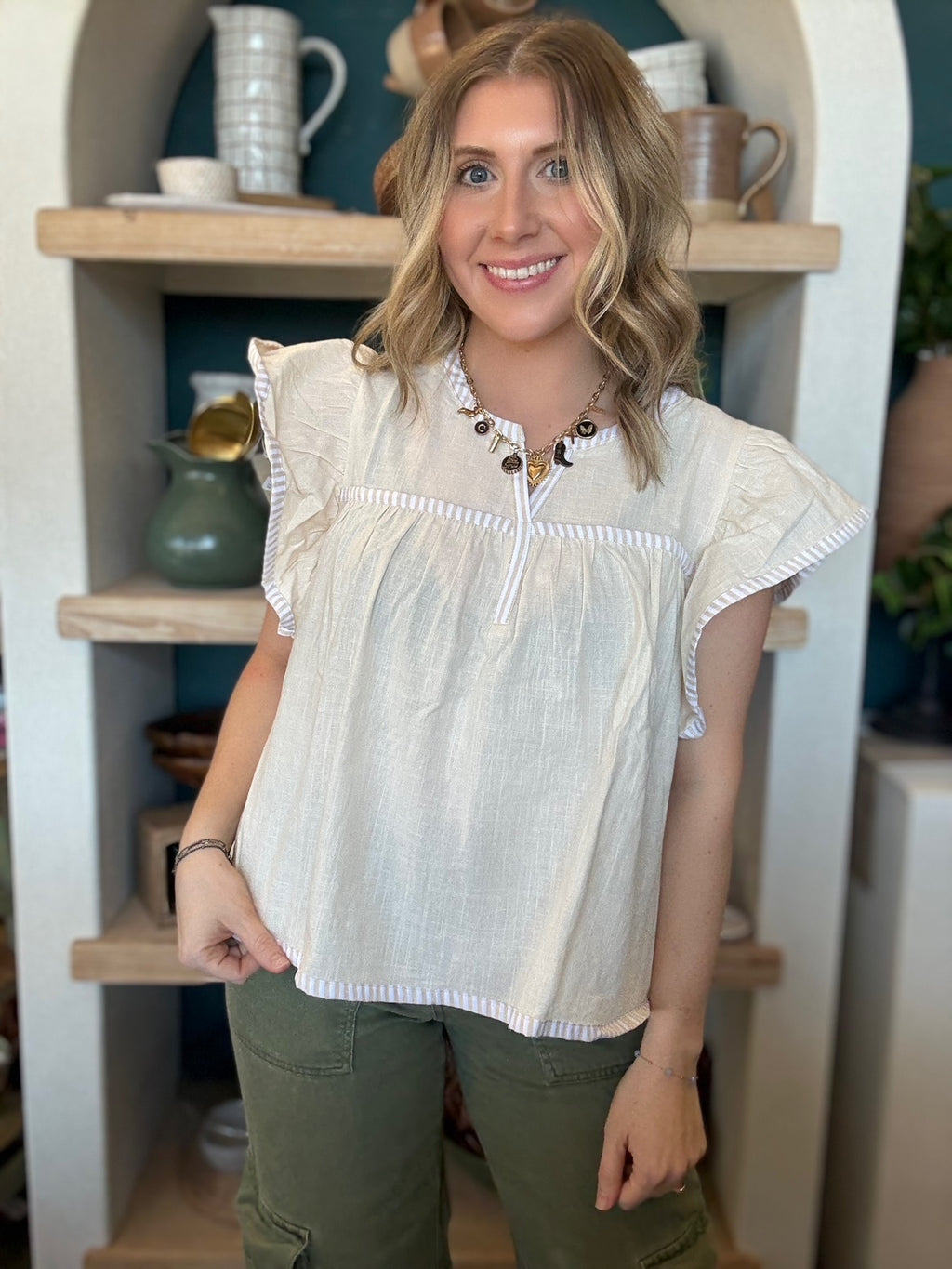 Ivory flutter sleeve boutique blouse for women