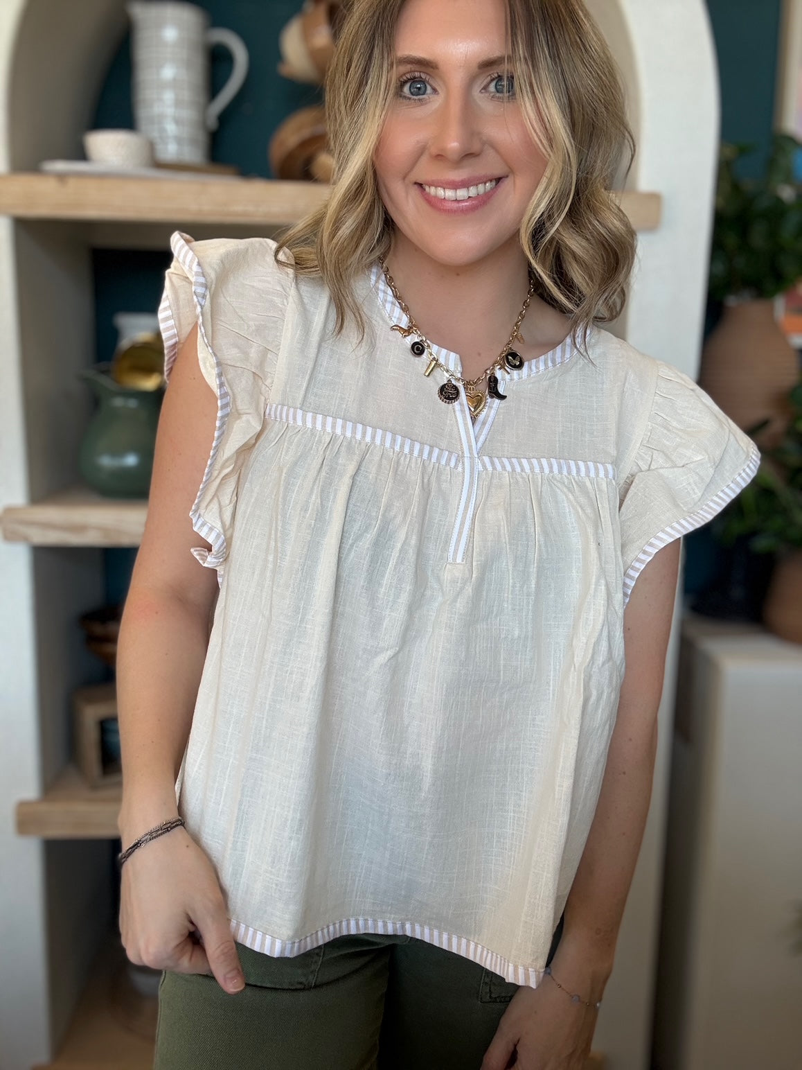 Ivory flutter sleeve boutique blouse for women
