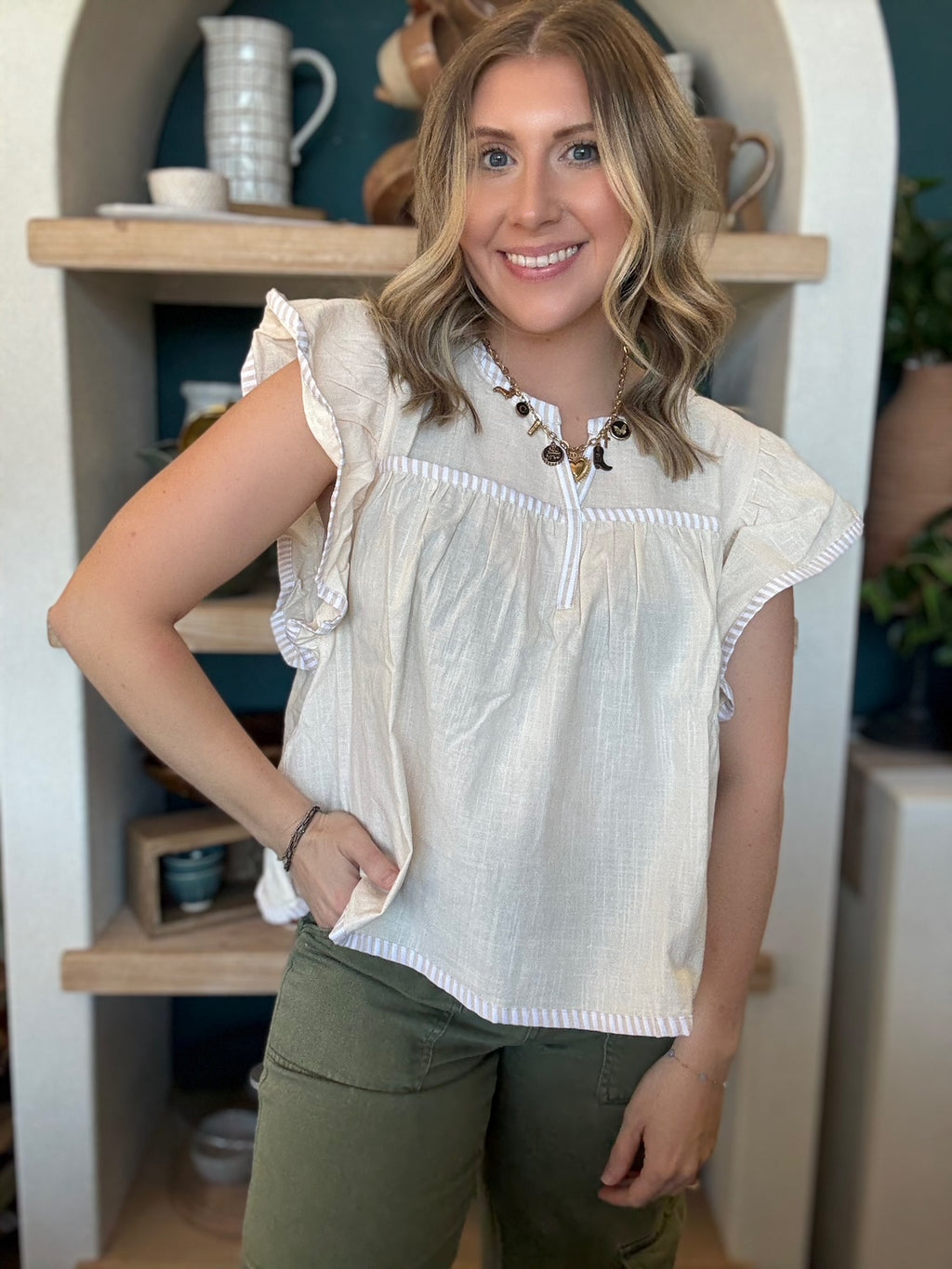 Ivory flutter sleeve boutique blouse for women