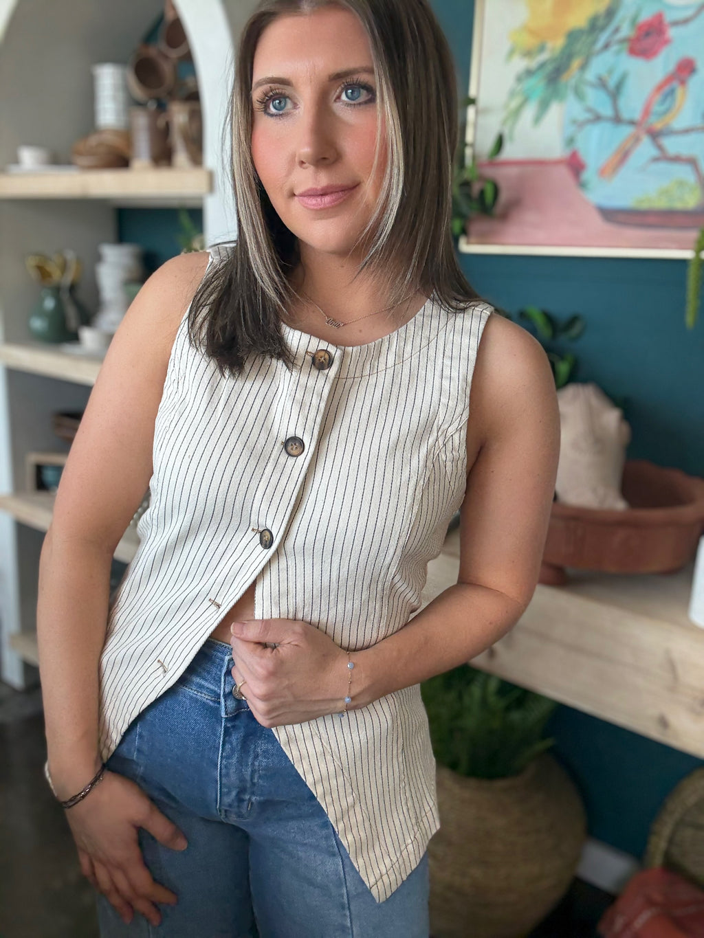 woman wearing natural striped sleeveless boutique button front tank top