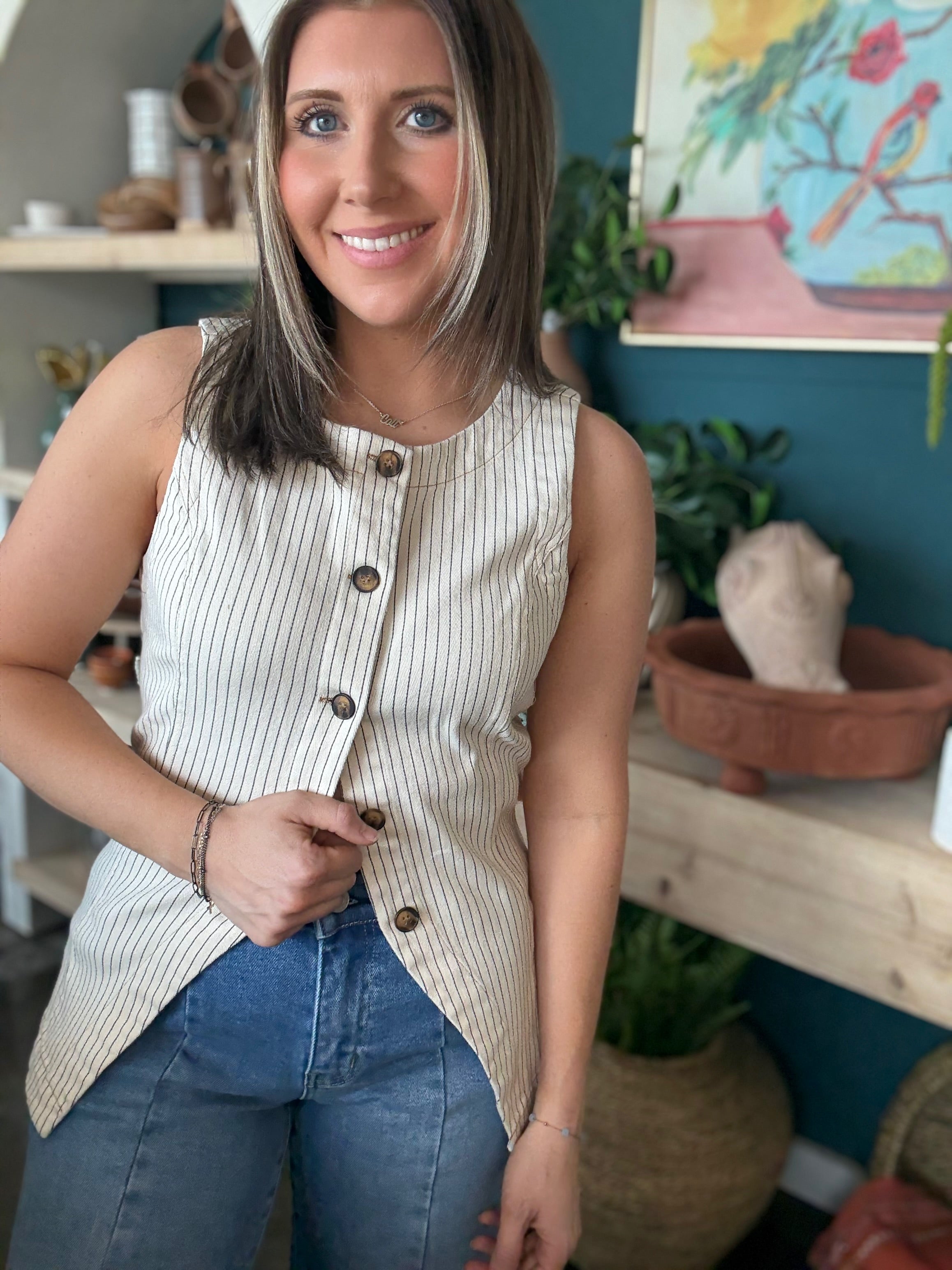 woman wearing natural striped sleeveless boutique button front tank top