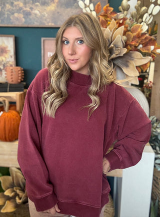 Burgundy mock neck sweatshirt with relaxed oversized fit