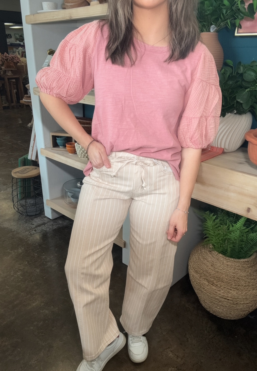 woman wearing sand striped drawstring boutique straight leg pants