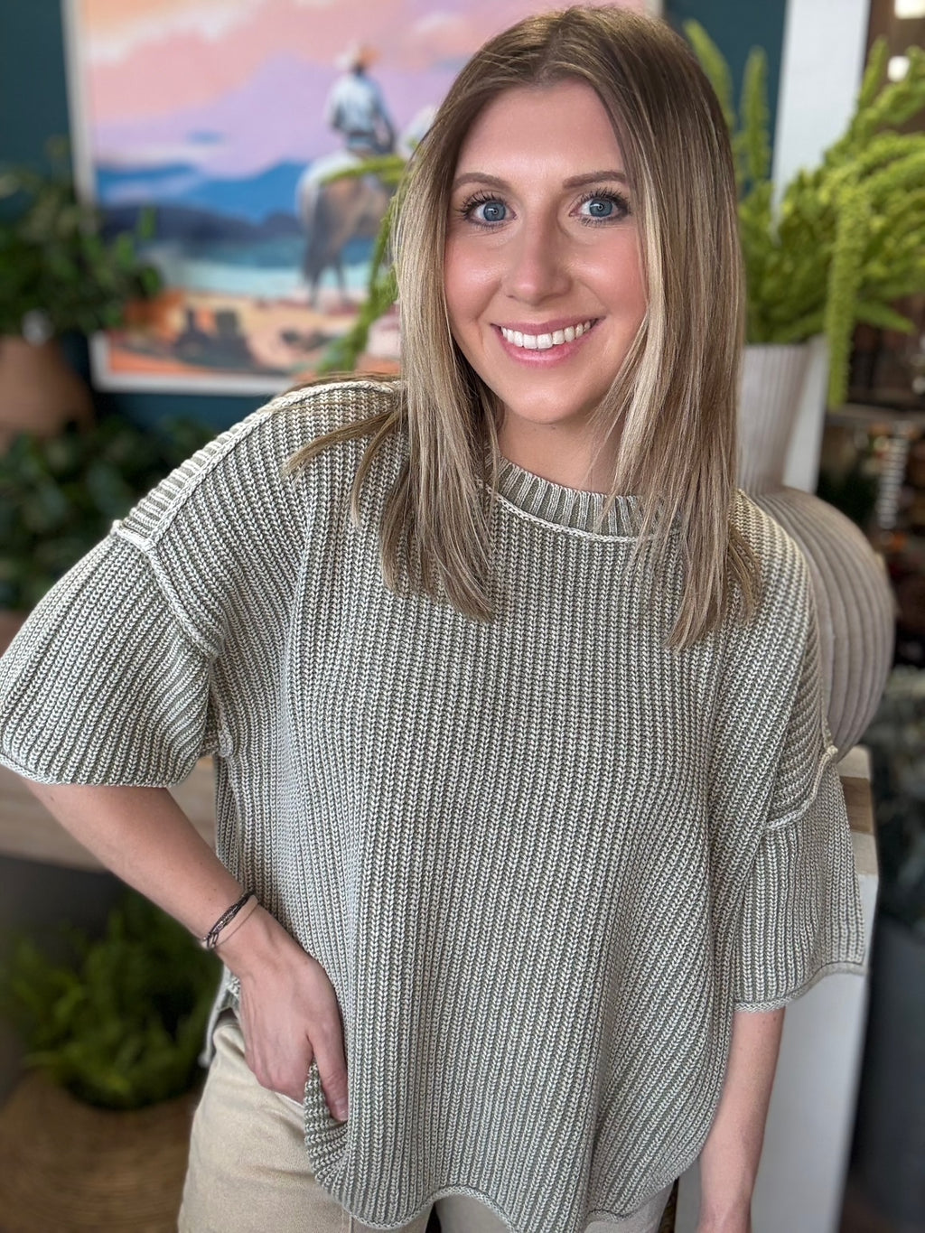 Sage ribbed knit short sleeve boutique top styled with neutral pants at Pill Box Boutique