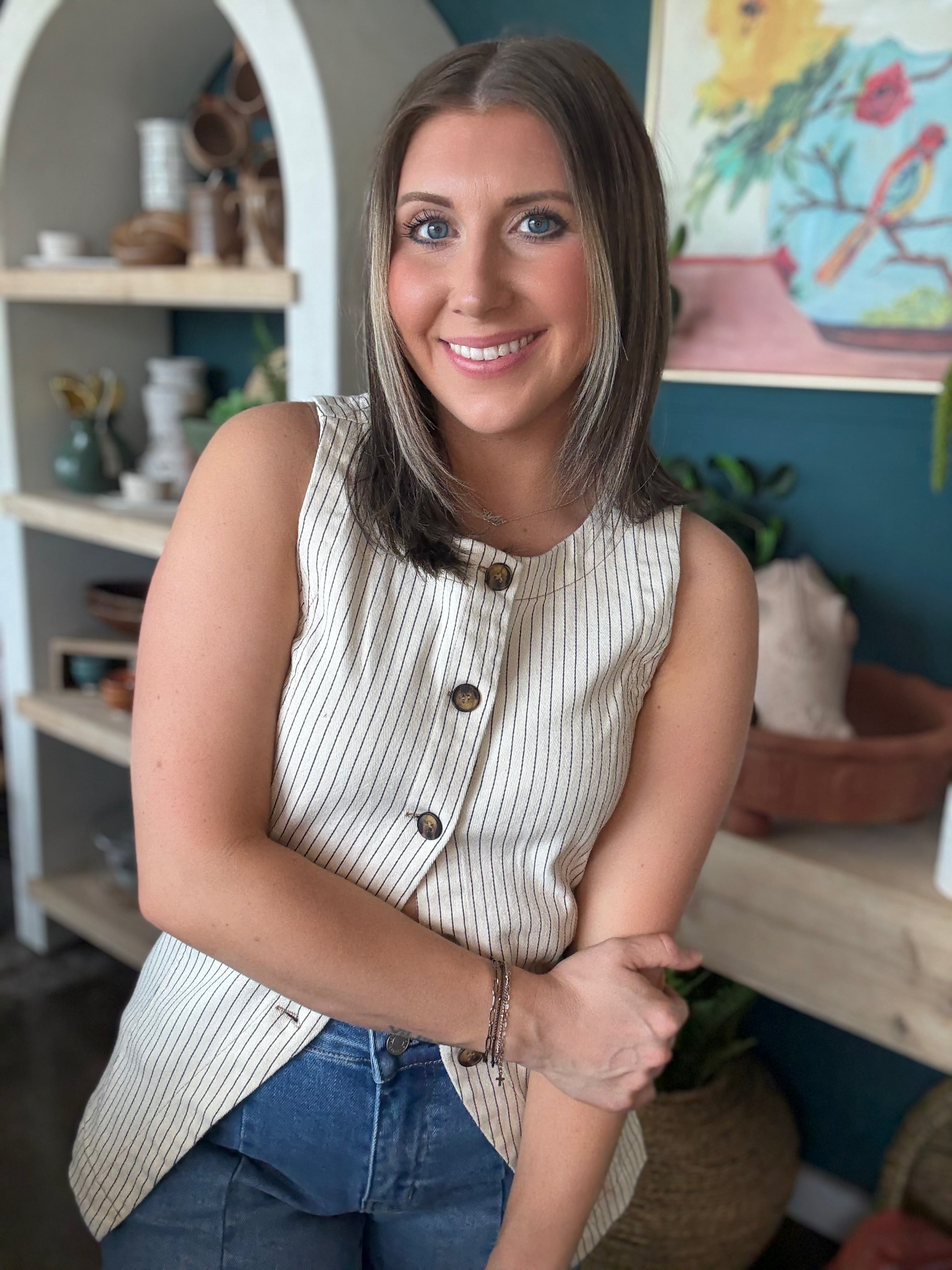 woman wearing natural striped sleeveless boutique button front tank top