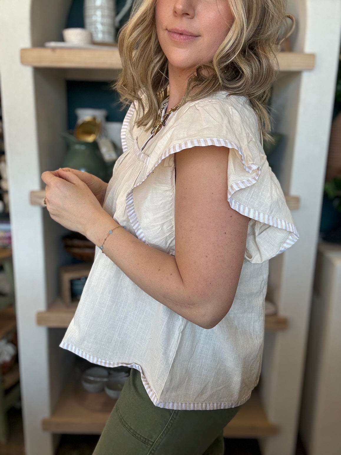 Ivory flutter sleeve boutique blouse for women