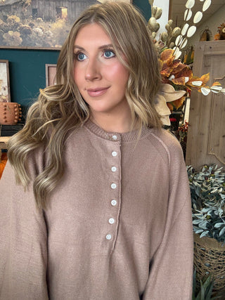 Taupe henley sweater top with button neckline and balloon sleeves