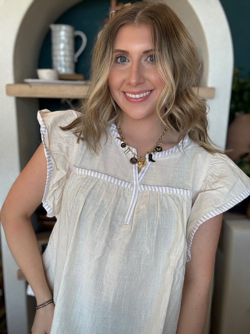 Ivory flutter sleeve boutique blouse for women