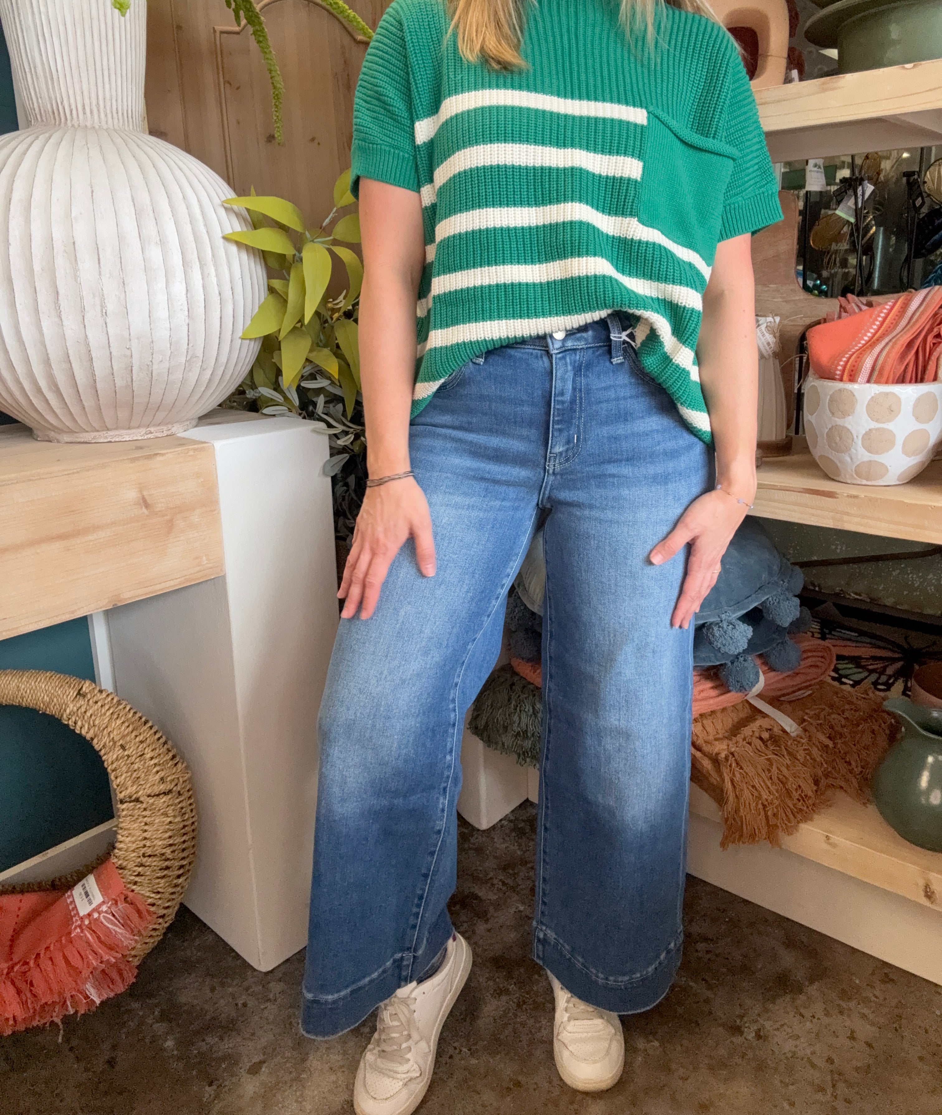 woman wearing high rise wide leg vintage wash boutique jeans