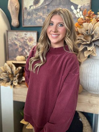 Burgundy mock neck sweatshirt with relaxed oversized fit
