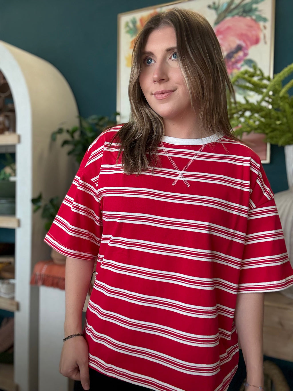 woman wearing red and white striped oversized patriotic boutique tee