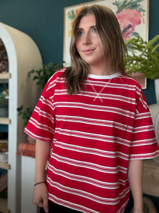 woman wearing red and white striped oversized patriotic boutique tee