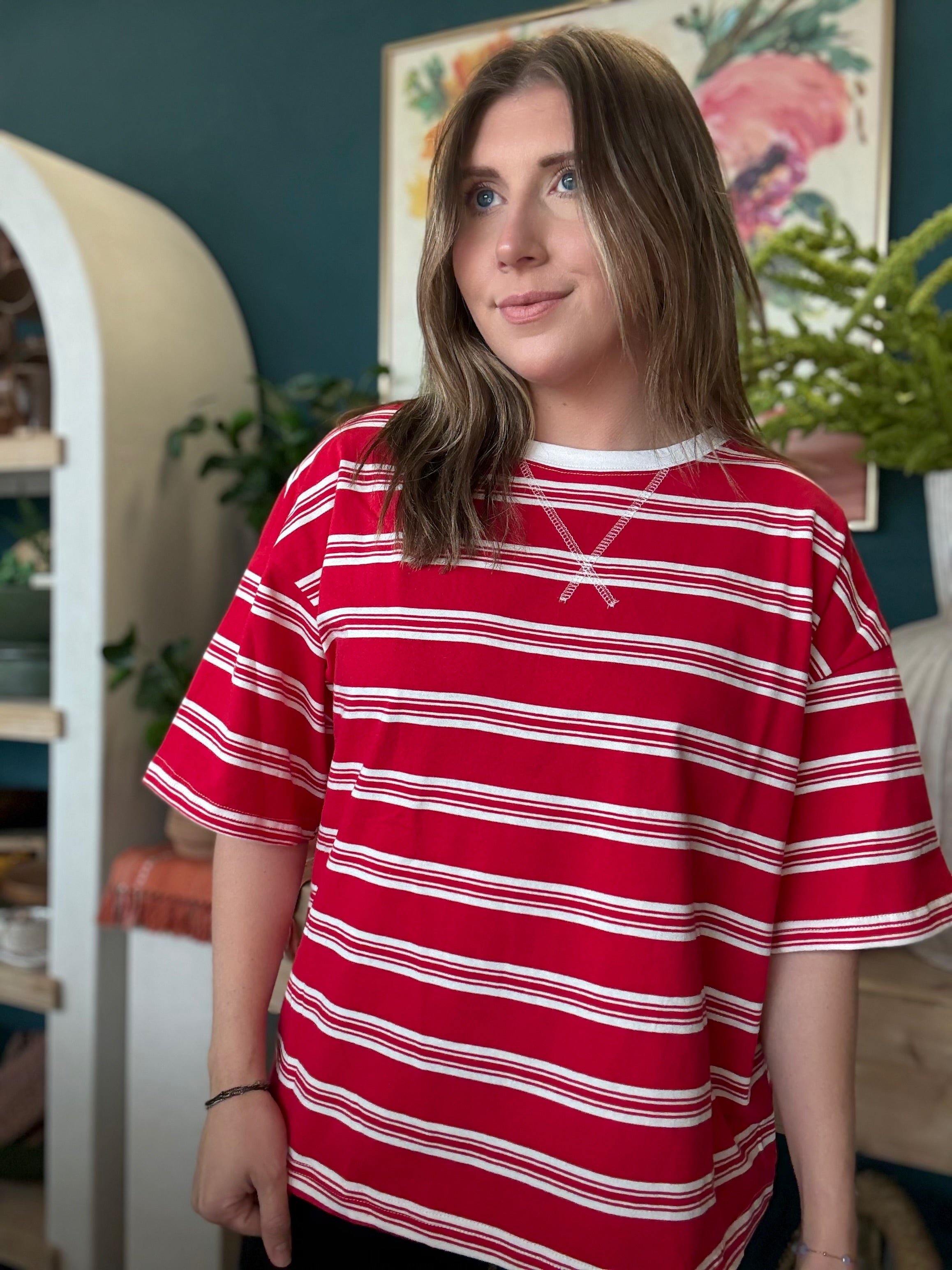 woman wearing red and white striped oversized patriotic boutique tee
