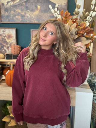 Burgundy mock neck sweatshirt with relaxed oversized fit