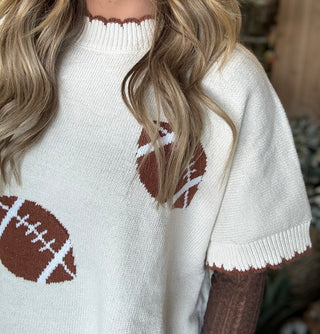 IVORY TAILGATE SWEATER WITH BROWN FOOTBALL PRINT