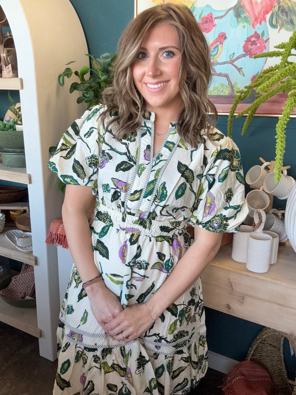 woman wearing woven botanical print mini dress with pockets