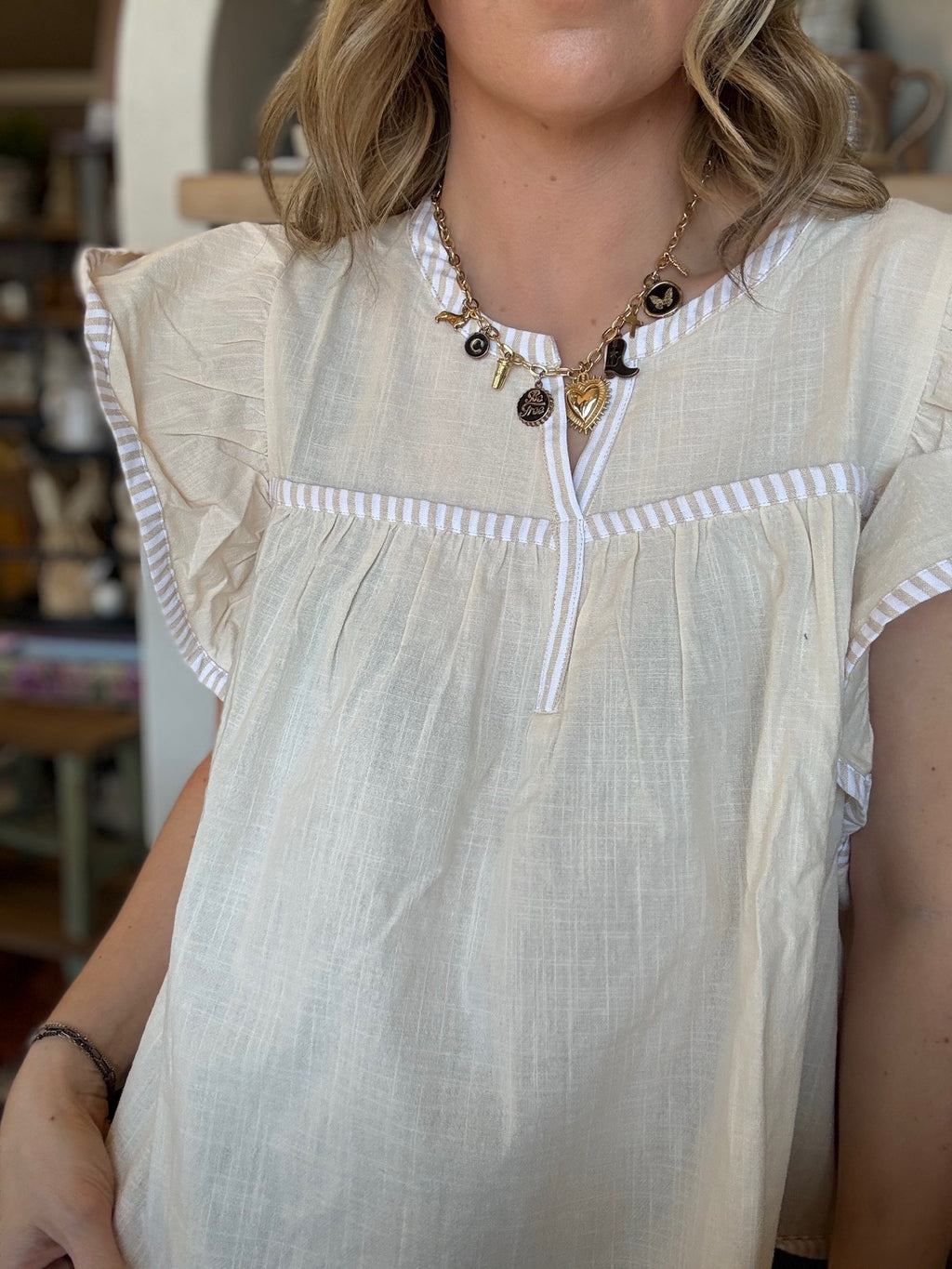 Ivory flutter sleeve boutique blouse for women