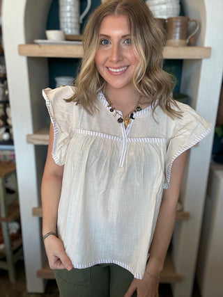 Ivory flutter sleeve boutique blouse for women