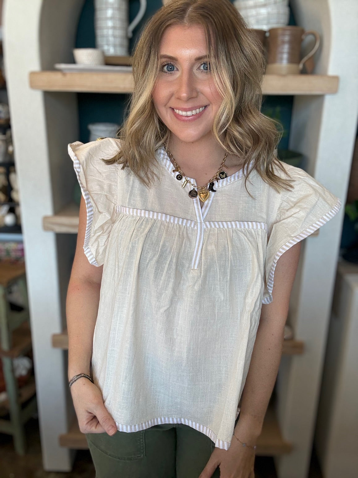 Ivory flutter sleeve boutique blouse for women
