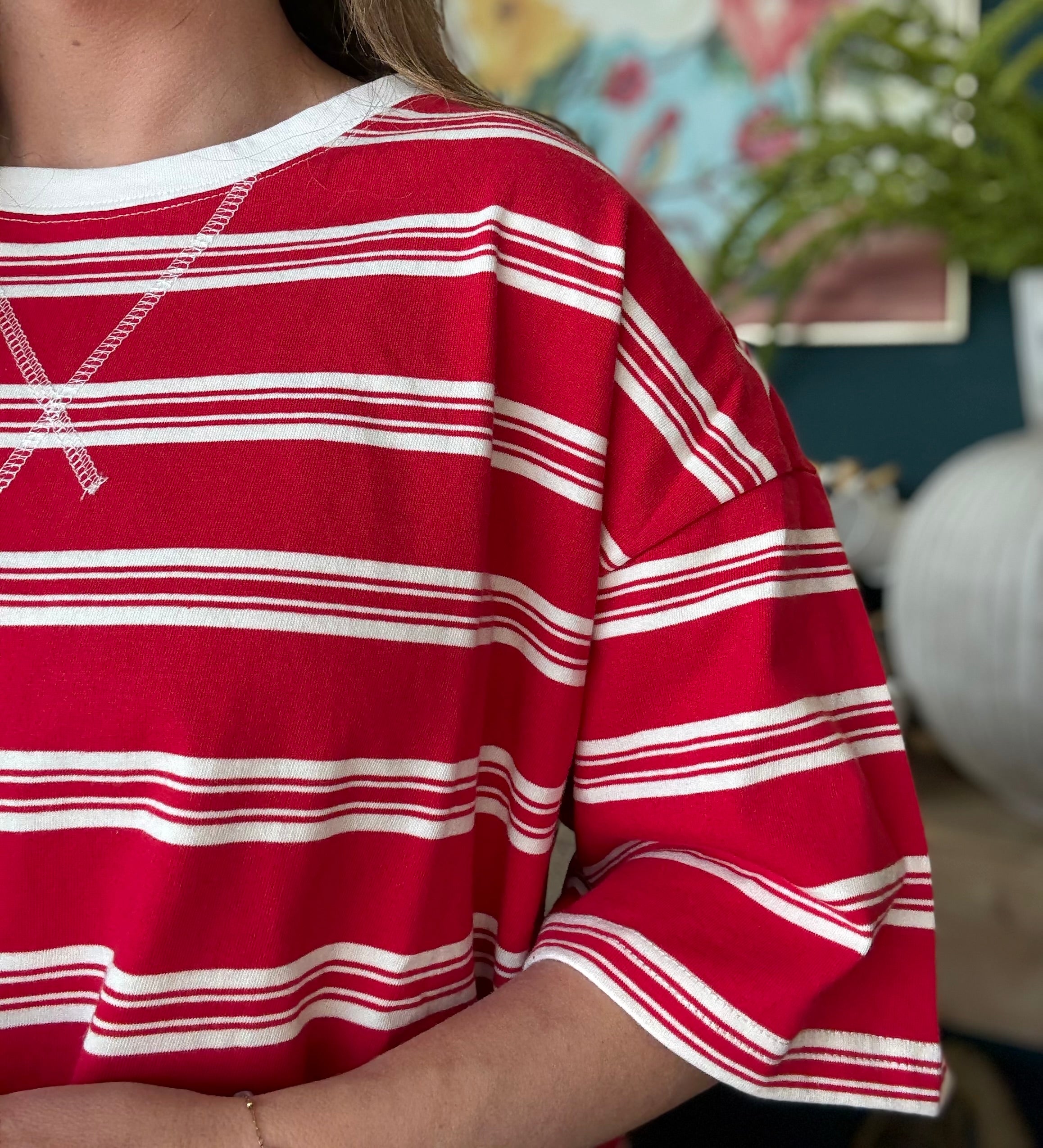 woman wearing red and white striped oversized patriotic boutique tee