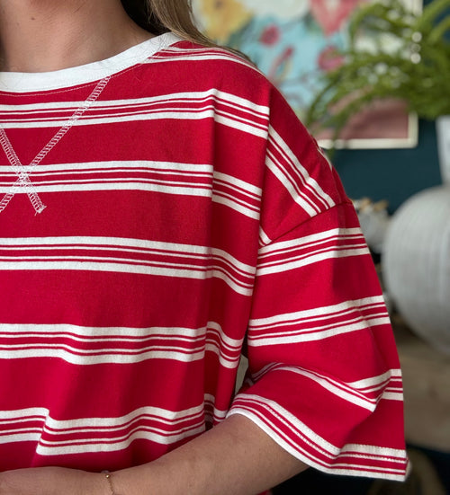woman wearing red and white striped oversized patriotic boutique tee