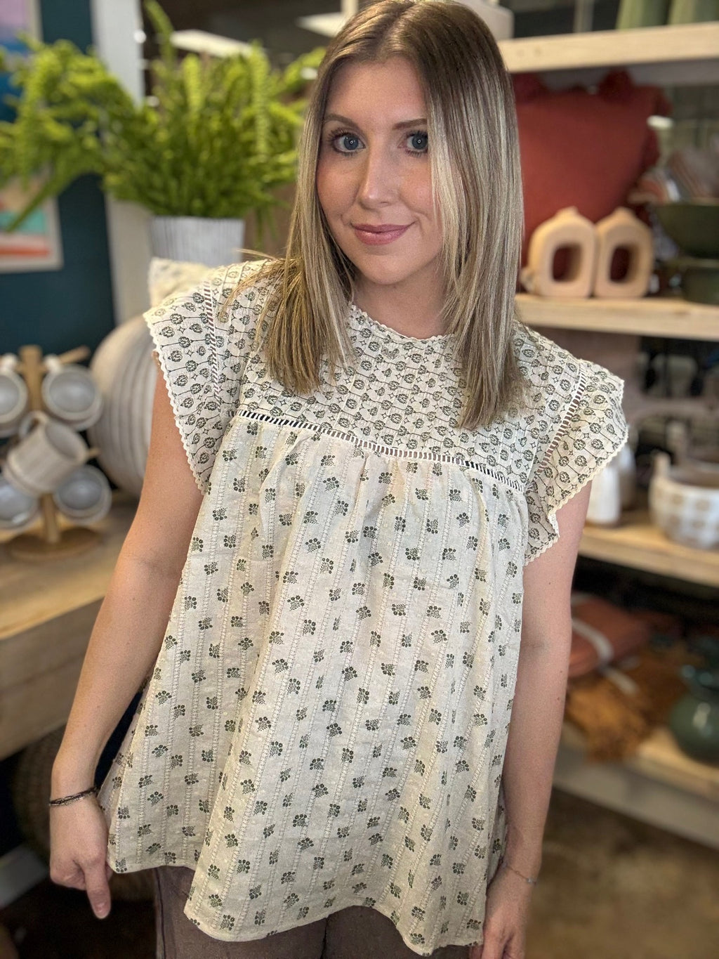 cream floral flutter sleeve boutique blouse at Pill Box Boutique