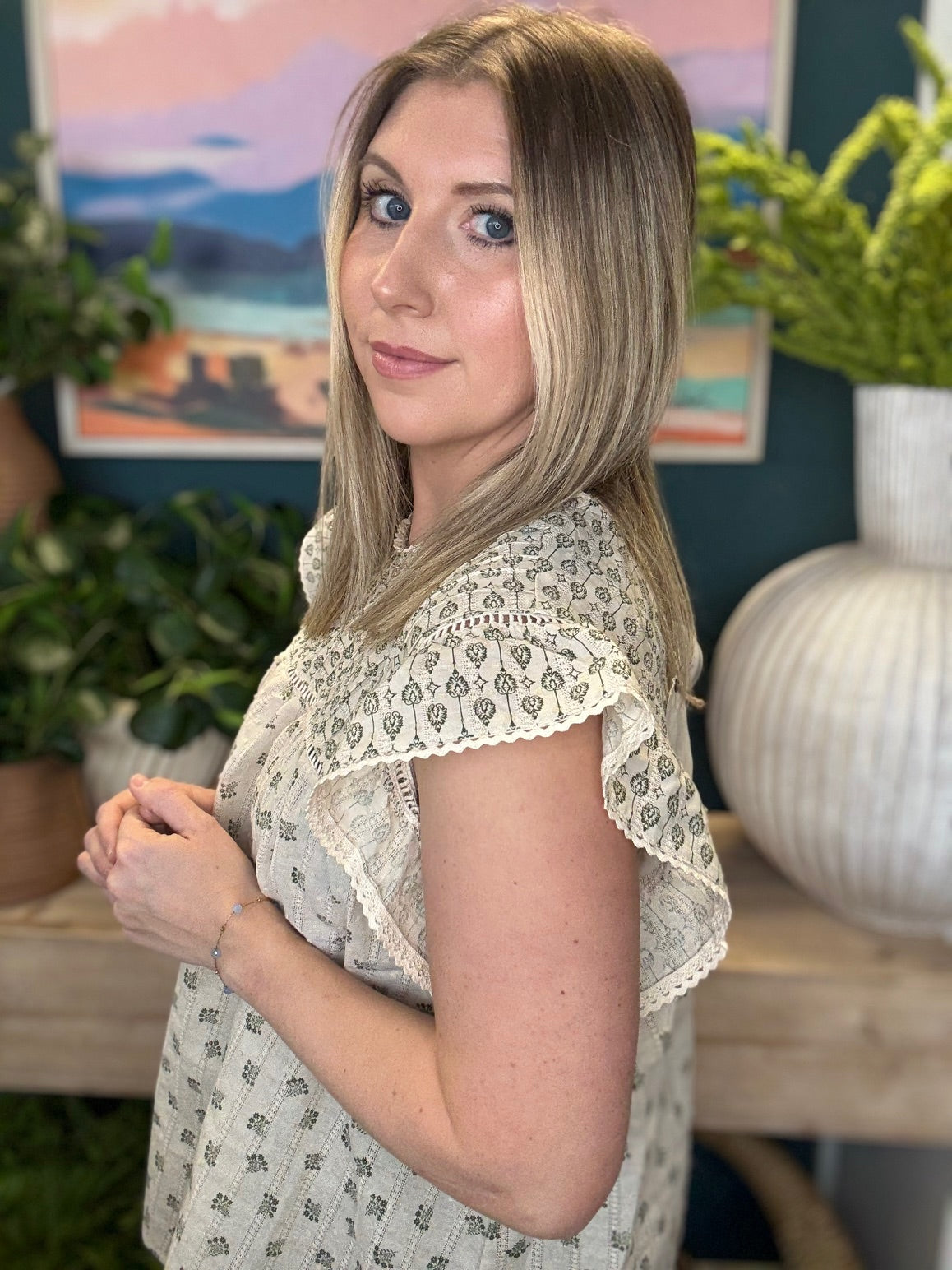 cream floral flutter sleeve boutique blouse at Pill Box Boutique