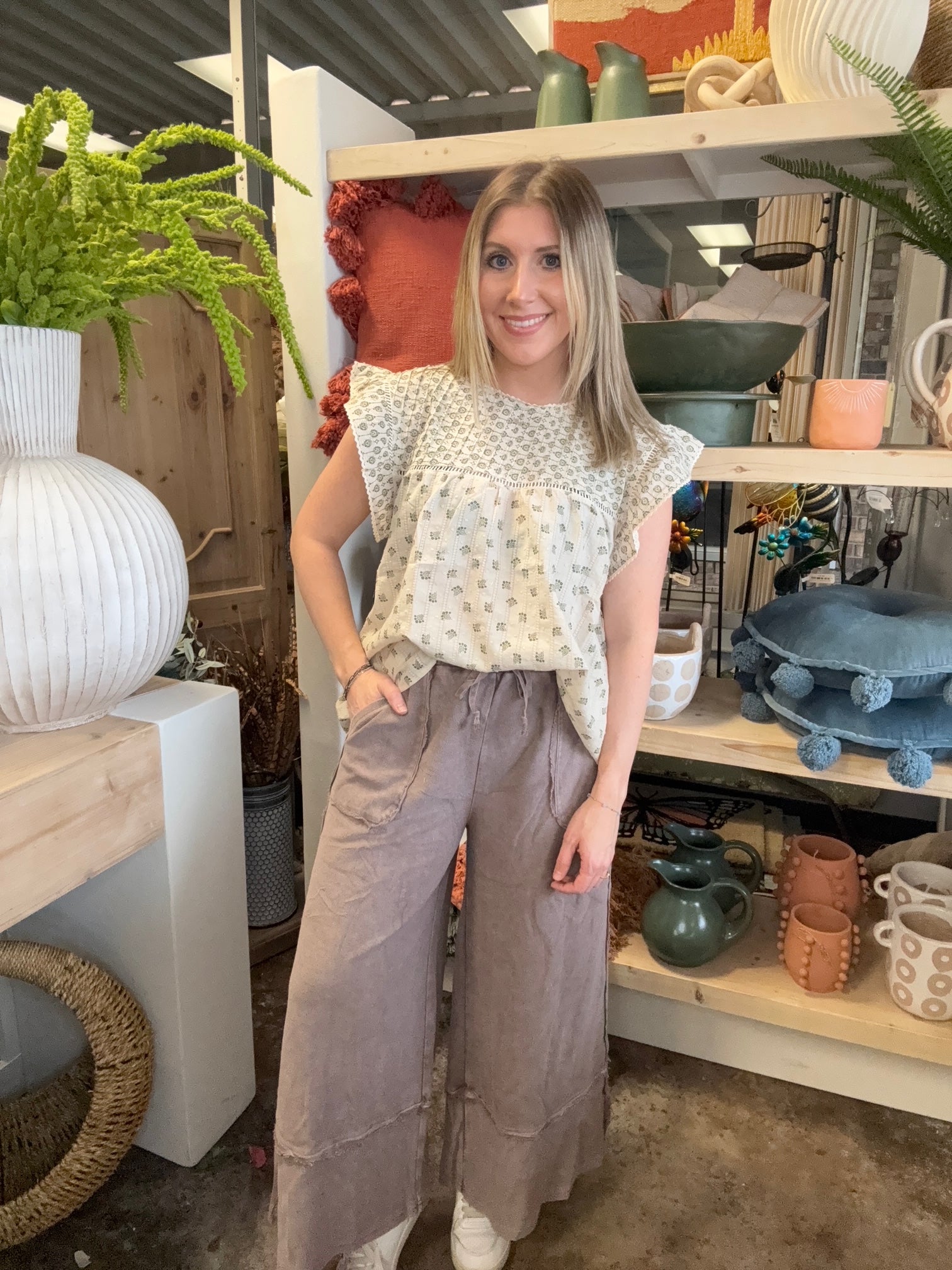 woman wearing mocha drawstring wide leg boutique pants with front pockets