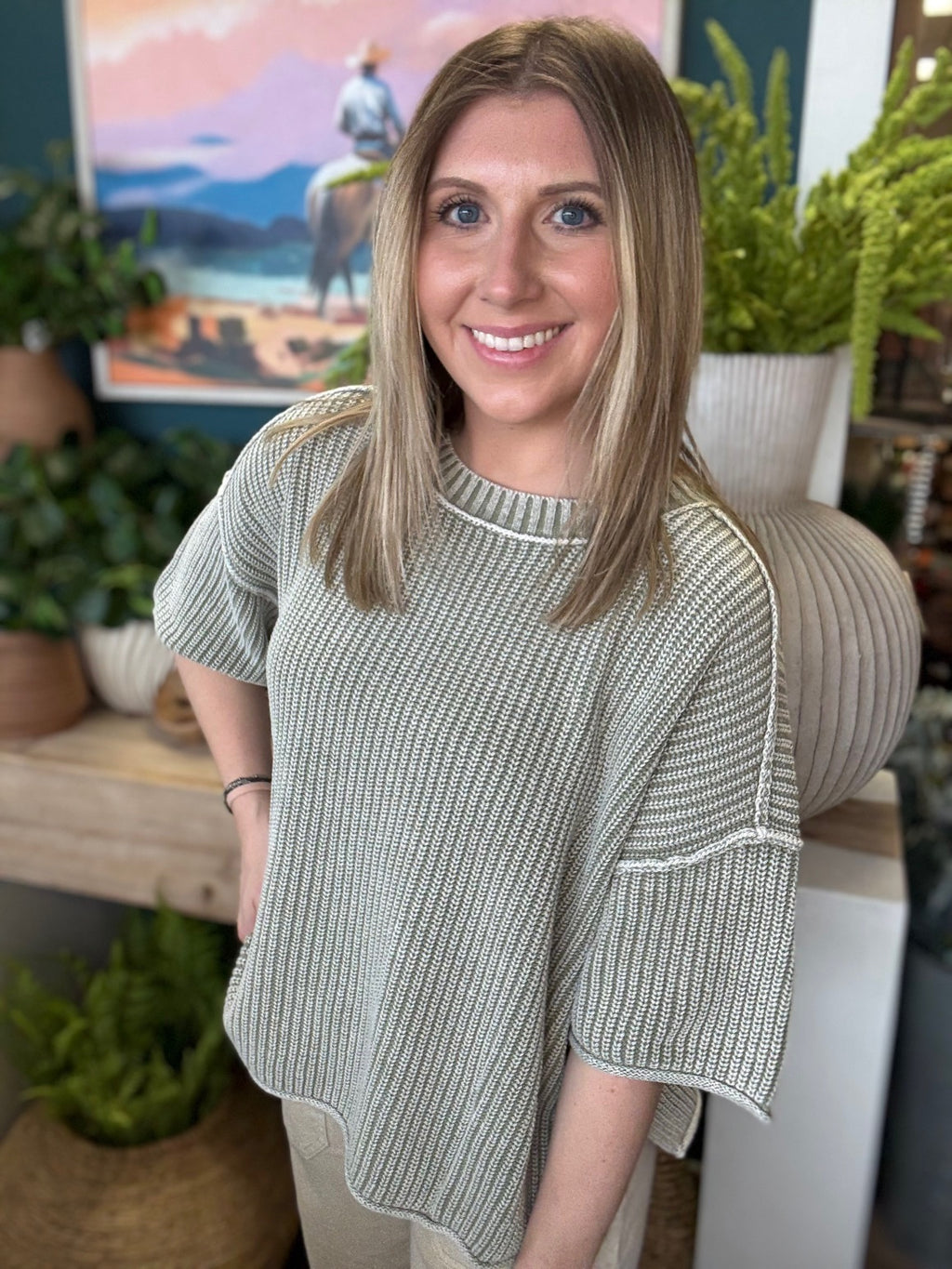 Sage ribbed knit short sleeve boutique top styled with neutral pants at Pill Box Boutique