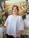 women's blue and apricot striped oversized knit top with relaxed fit and exposed seam details