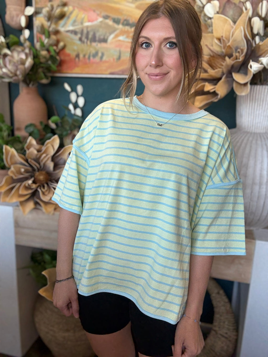 women's mint green and blue striped oversized knit top with relaxed fit and wide sleeves
