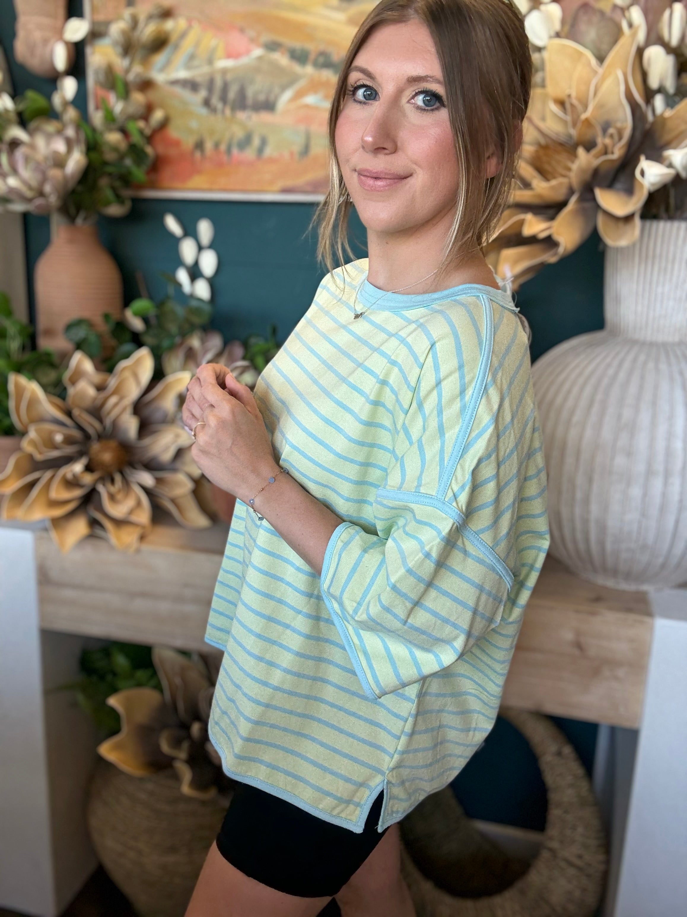 women's mint green and blue striped oversized knit top with relaxed fit and wide sleeves
