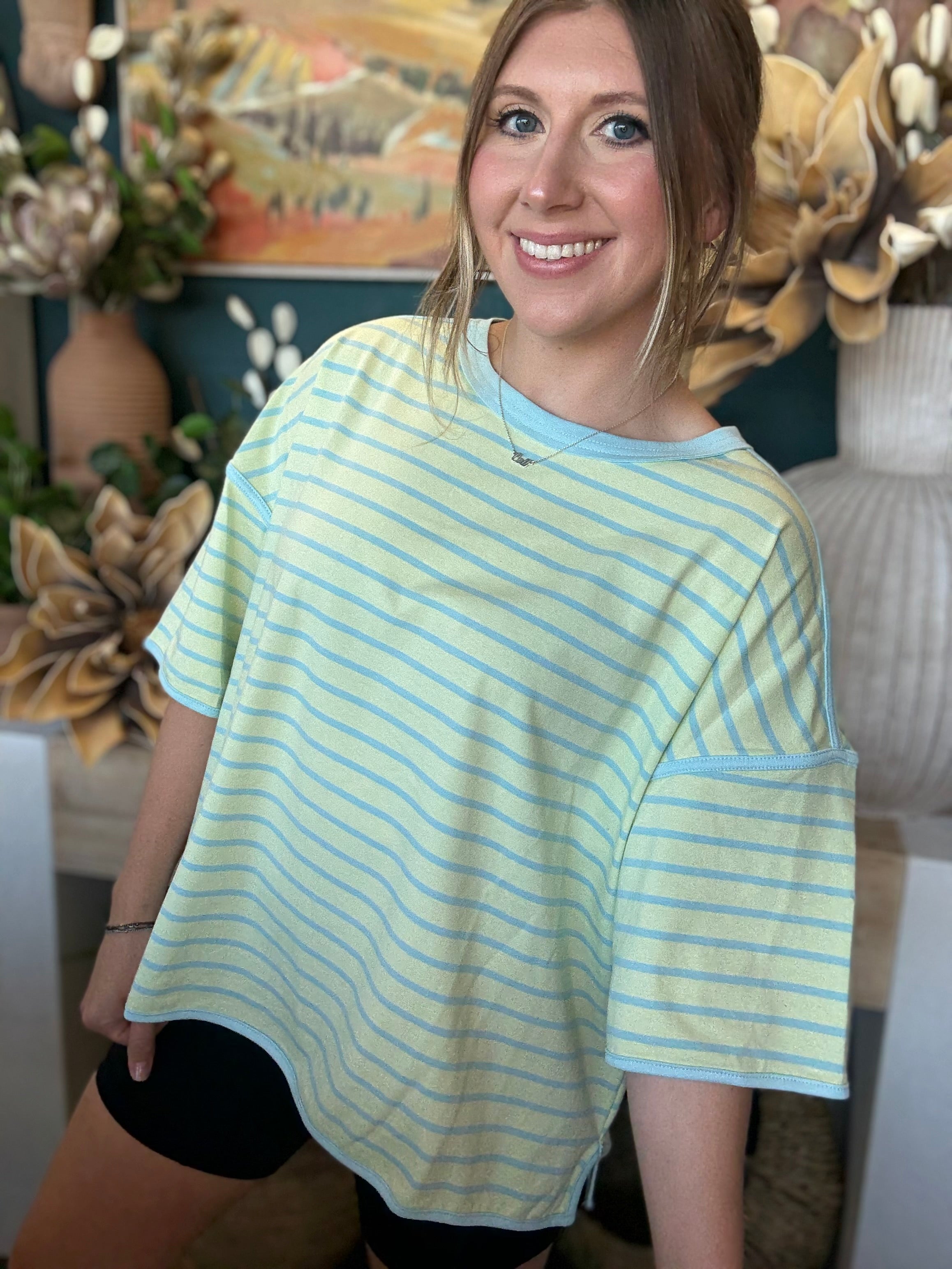women's mint green and blue striped oversized knit top with relaxed fit and wide sleeves