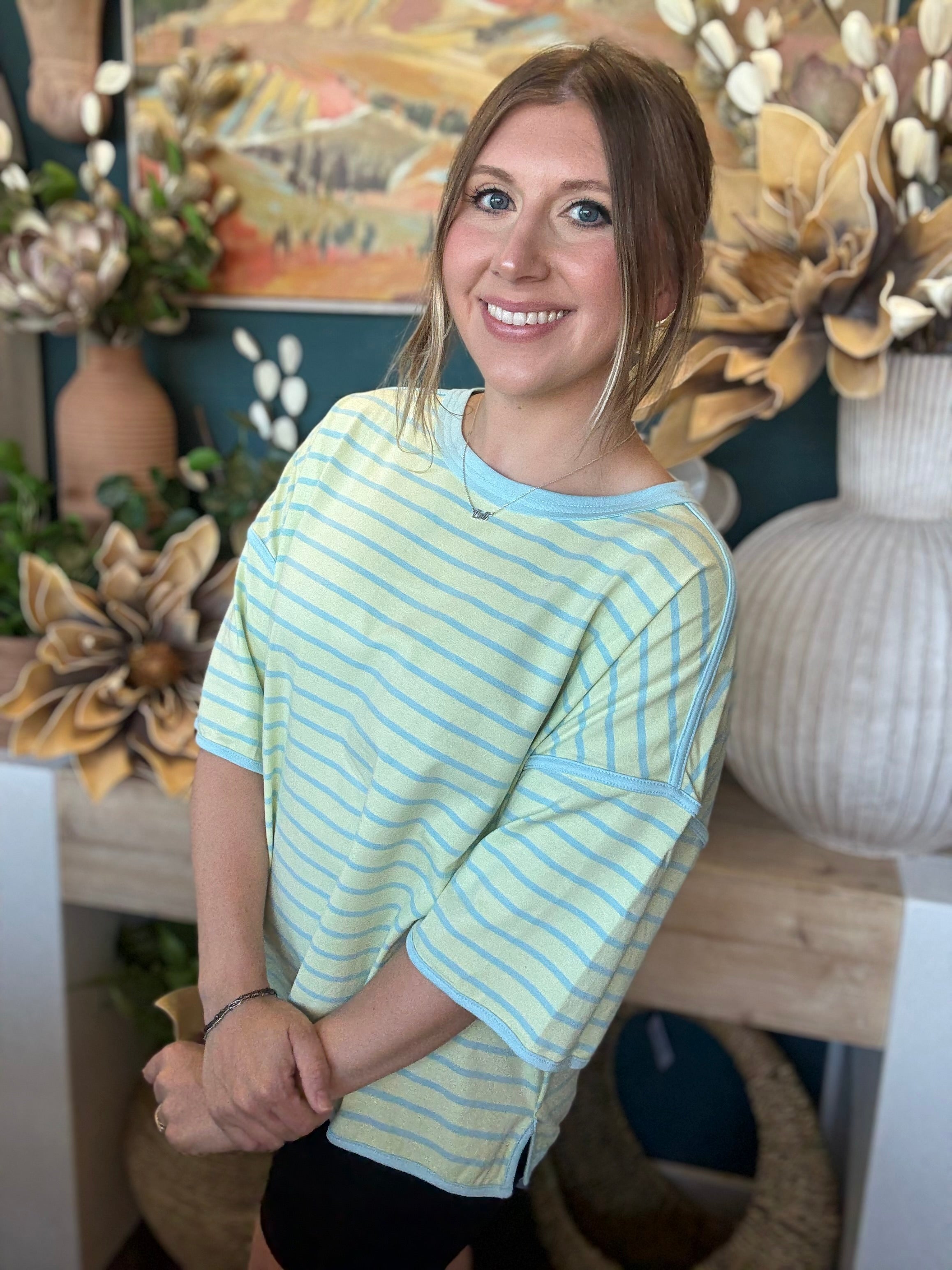 women's mint green and blue striped oversized knit top with relaxed fit and wide sleeves