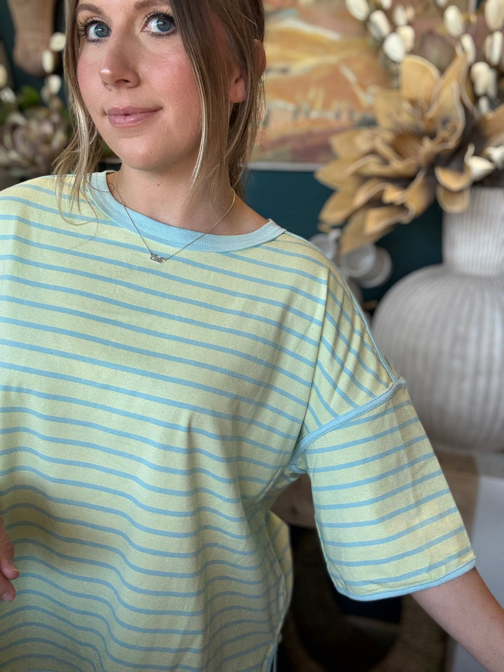 women's mint green and blue striped oversized knit top with relaxed fit and wide sleeves